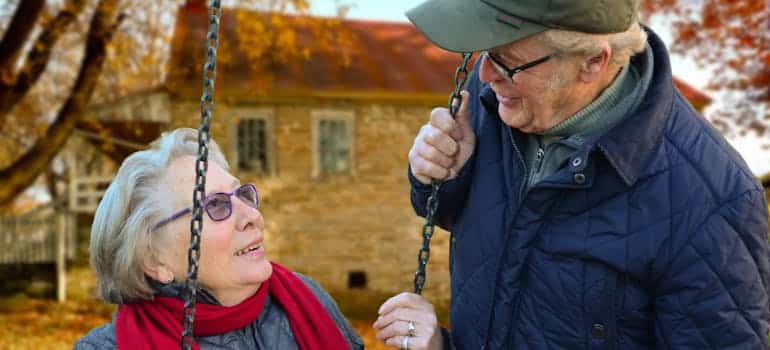 A senior couple talking about the benefits of moving to Florida