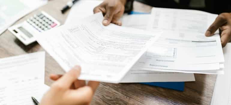 A person holding a document