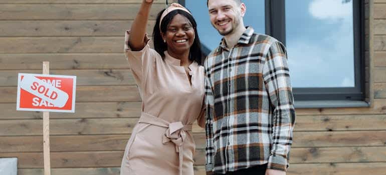 A couple holding a house key